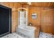 Bathroom with a tub and shower combination, and wood walls at 3910 6Th Nw St, Hickory, NC 28601