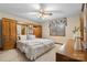 Main bedroom with built-in wooden cabinets and a ceiling fan at 3910 6Th Nw St, Hickory, NC 28601