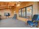 Sunroom with two armchairs and a view into the dining room at 3910 6Th Nw St, Hickory, NC 28601