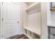 Laundry area with built-in bench and storage at 4000 Cheyney Park Dr, Charlotte, NC 28269