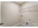 Laundry room with wire shelving and hookups at 4000 Cheyney Park Dr, Charlotte, NC 28269