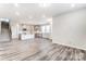 Open concept living space with hardwood floors at 4000 Cheyney Park Dr, Charlotte, NC 28269