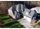 Expansive home with a well-manicured lawn, mature landscaping, and a three-car garage in a serene setting at 407 Blue Bay Ct, York, SC 29745