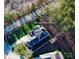 Aerial view showing approximate property lines on a large lot with mature trees surrounding the house at 407 Blue Bay Ct, York, SC 29745