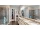 Beautiful bathroom with double sinks, granite countertops, and walk-in closets at 407 Blue Bay Ct, York, SC 29745