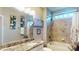This bathroom features a granite countertop and a shower-tub combo at 407 Blue Bay Ct, York, SC 29745