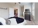 This bedroom features a ceiling fan, neutral walls and a dark dresser at 407 Blue Bay Ct, York, SC 29745