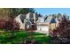 Beautiful brick home featuring a three-car garage and well-manicured lawn, perfect for suburban living at 407 Blue Bay Ct, York, SC 29745