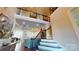 Grand foyer with soaring ceilings, iron-railed staircase, and open view to living and dining areas at 407 Blue Bay Ct, York, SC 29745