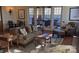 Sun-drenched living room with comfortable seating, elegant decor, and access to an outdoor balcony at 407 Blue Bay Ct, York, SC 29745