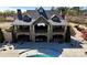Aerial view showcasing the community pool area with the clubhouse and lounge seating at 407 Blue Bay Ct, York, SC 29745