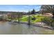 Aerial view of lakefront property with walking path and fire pit at 4350 Reed Creek Dr, Sherrills Ford, NC 28673