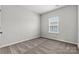 Simple bedroom with neutral carpeting and window at 4350 Reed Creek Dr, Sherrills Ford, NC 28673