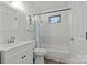 Bathroom with white vanity, bathtub, and shower curtain at 4618 New Town Rd, Waxhaw, NC 28173