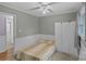 Bedroom with double bed, white wardrobe, and access to another room at 4618 New Town Rd, Waxhaw, NC 28173