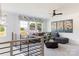 Spacious living room with gray sectional sofa and large windows at 504 Meadow Ridge Dr, Belmont, NC 28012