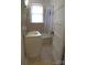 Bathroom featuring tiled floor, tiled walls, vanity, sink, bathtub and shower at 515 N Pine Ln, Wadesboro, NC 28170