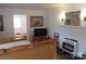 Bedroom featuring a fireplace, and cozy furniture at 515 N Pine Ln, Wadesboro, NC 28170