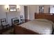 Bedroom with a decorative fireplace and a classic bed at 515 N Pine Ln, Wadesboro, NC 28170