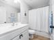 Clean bathroom with white vanity and tub shower combo at 521 Summer Creek Dr, Stanley, NC 28164