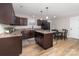 Kitchen with an island and stainless steel appliances at 521 Summer Creek Dr, Stanley, NC 28164