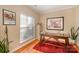 Bright home office features built-in shelving and hardwood floors at 5681 Berry Ridge Dr, Harrisburg, NC 28075