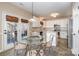 Kitchen with breakfast nook and access to backyard patio at 5681 Berry Ridge Dr, Harrisburg, NC 28075