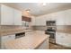 Kitchen with stainless steel appliances and tile countertops at 5681 Berry Ridge Dr, Harrisburg, NC 28075