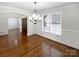 Bright dining room with hardwood floors and chandelier at 6000 Bickett Ridge Dr, Monroe, NC 28110