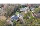 Aerial view showcasing home's location in a tree-lined neighborhood at 6030 Sharon Hills Rd, Charlotte, NC 28210