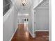 Hardwood floor entryway looking toward the living room and office at 6030 Sharon Hills Rd, Charlotte, NC 28210