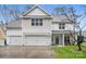 Two-story house with neutral siding, white trim, and a two-car garage at 6030 Sharon Hills Rd, Charlotte, NC 28210