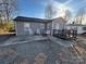 Back exterior view of home with patio at 604 Kimball St, Kannapolis, NC 28081