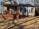 Gray siding ranch home with wooden porch at 604 Kimball St, Kannapolis, NC 28081