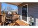 Wooden porch with grill and view of a neighboring house at 604 Kimball St, Kannapolis, NC 28081