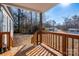 Wooden porch with railing, offering a relaxing view of the backyard at 604 Kimball St, Kannapolis, NC 28081