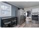 Modern kitchen with stainless steel appliances and breakfast bar at 604 Kimball St, Kannapolis, NC 28081