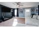 Spacious living room with a sectional sofa and wall-mounted TV at 604 Kimball St, Kannapolis, NC 28081