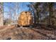 Wooden storage shed in backyard at 604 Kimball St, Kannapolis, NC 28081