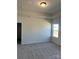 Serene bedroom with plush carpeting, a window view, and a ceiling fan at 6327 Honor Ave, Midland, NC 28107