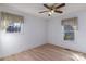 Light-filled bedroom with hardwood floors and window views at 7753 Old Post Rd, Denver, NC 28037