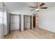 Neutral bedroom with hardwood floors and ample closet space at 7753 Old Post Rd, Denver, NC 28037