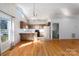 Bright kitchen with wood cabinets, hardwood floors and ample natural light at 7753 Old Post Rd, Denver, NC 28037