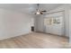 Bright bedroom with hardwood floors and en-suite bathroom at 7753 Old Post Rd, Denver, NC 28037