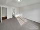 Bright bedroom with carpet and access to bathroom at 811 Reigate Rd, Charlotte, NC 28262