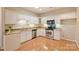 Kitchen with granite countertops and stainless steel appliances at 8355 Olde Troon Dr, Charlotte, NC 28277