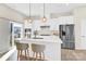 Modern kitchen with white cabinets, stainless steel appliances, and island at 9131 Nw Harwen Ne Ln # 32, Charlotte, NC 28215