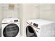 Laundry room with modern Samsung washer and dryer at 9131 Nw Harwen Ne Ln # 32, Charlotte, NC 28215