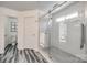 Bathroom with walk-in shower, gray hexagon floor tile and white subway tile at 100 Sea Island Blvd, Fort Mill, SC 29708