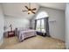 Bedroom with vaulted ceiling, ceiling fan, and window seat at 100 Sea Island Blvd, Fort Mill, SC 29708